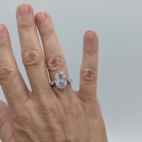 Large Oval Cut Diamond Alternative Solitaire - Picture 7 of 9